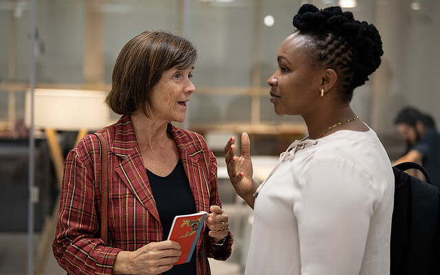 Dr. Muriithi with BSE Director Teresa Garcia-Milà at this fall's Economics Trobada