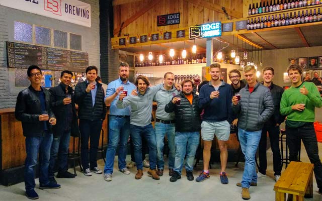 Alumni at a beer tasting in a local brewery in Barcelona