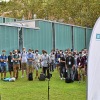 Students attend the welcome session outdoors with masks and social distancing for Covid-19 safety